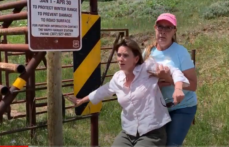 Elaine Flores catches Melissa Cook when she falls filming the Wyoming Jeepers