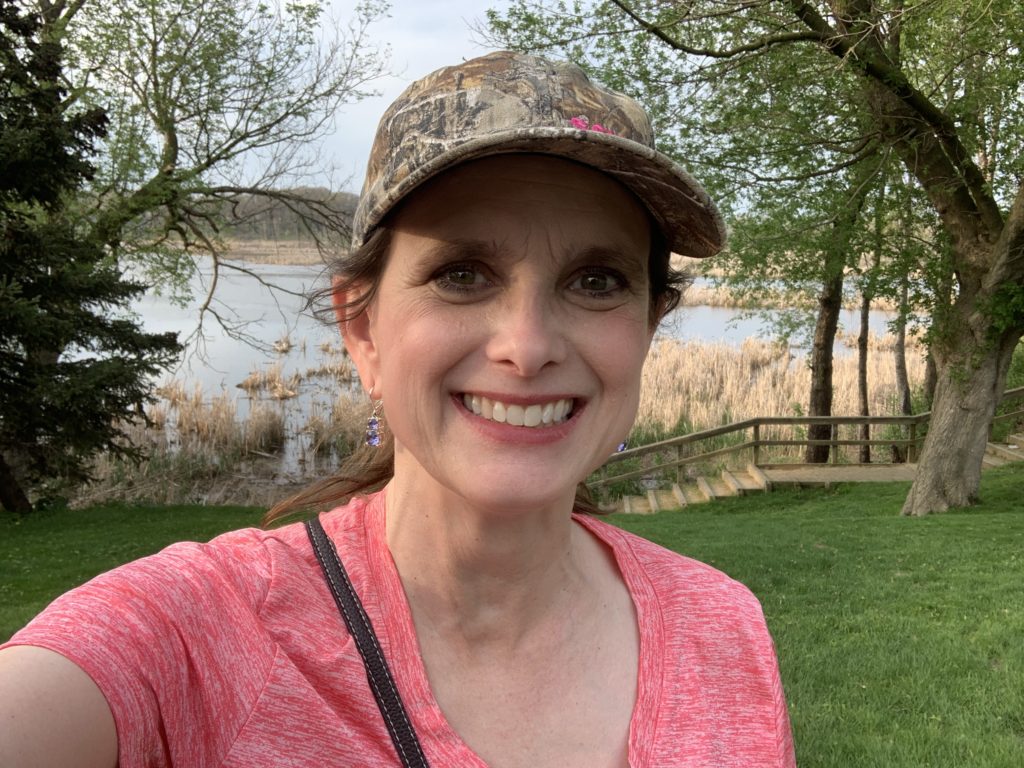 Melissa Cook hiking along Lake Michigan in 2022