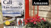 The Call of the Last Frontier book displayed with Christmas garland