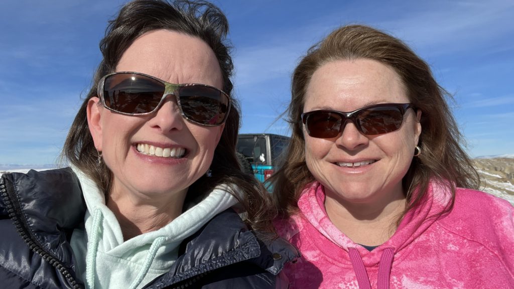 Melissa Cook & Jeanene Lundsford smile for the camera